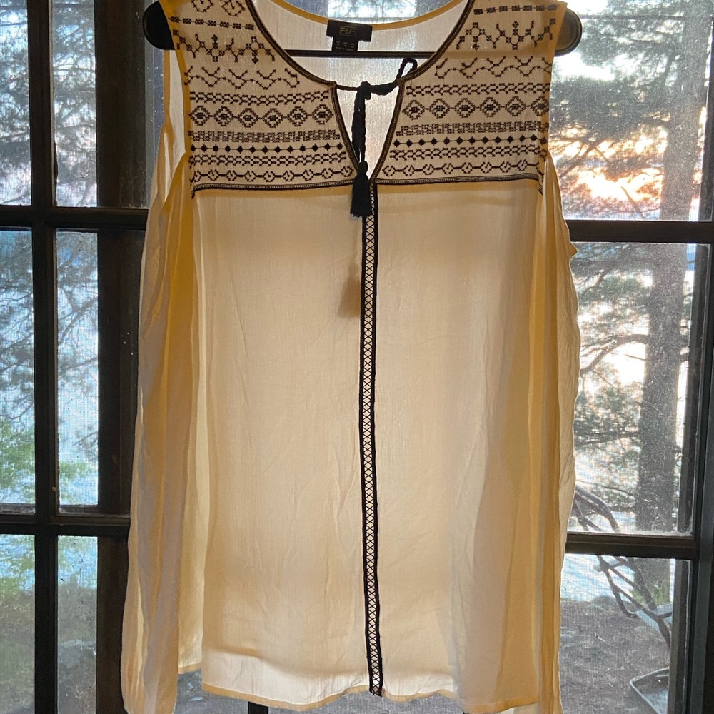 F and F shoulder cut out blouse.